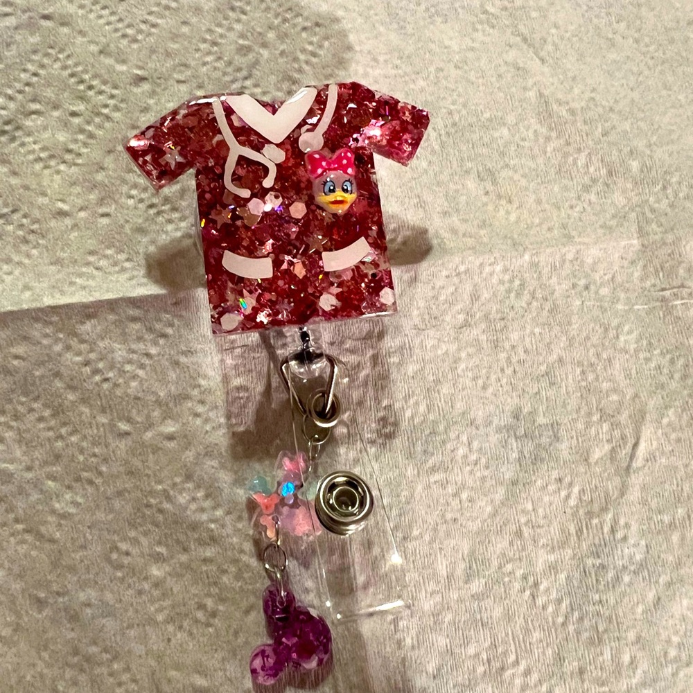 New Daisy Duck Pink Glitter Nurse Badge Reel with charms